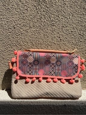 Woven Neutral Foldover Clutch with Coral Trim and Pom-Poms